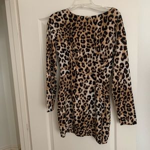 Beautiful new night club or cocktail dress. It has an opening on the back